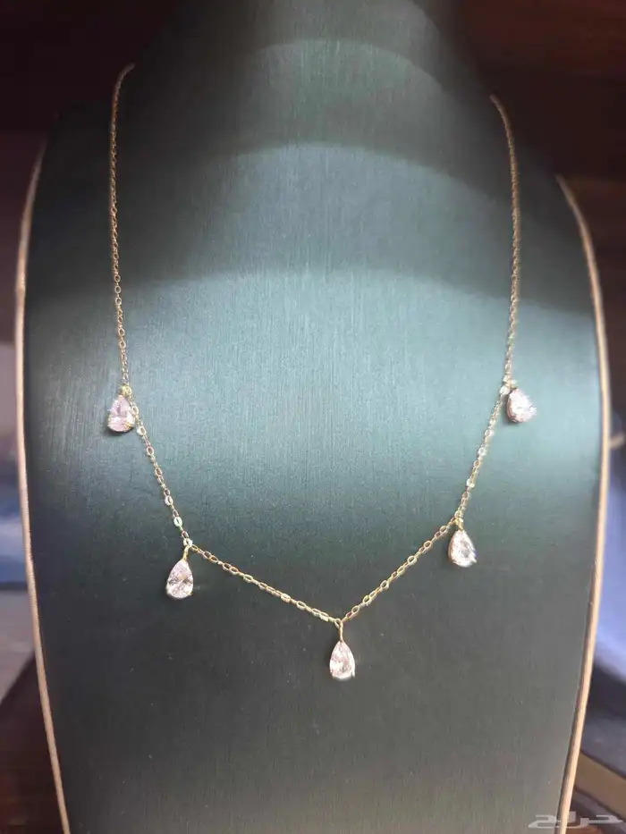 تعليقه ذهب أصفر خالص عيار 18 مرصعه بالزركون الوزن 1.7 جرام 0