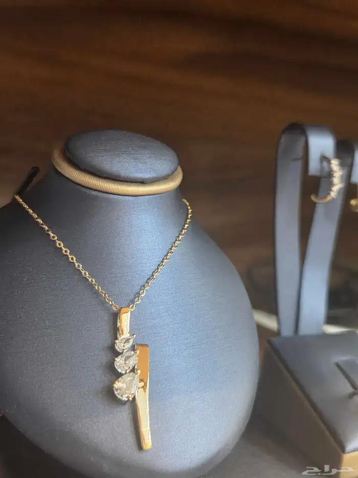 نصف طقم ذهب أصفر خالص عيار 18 مرصع بالزركون الوزن 7.5 جرام 2