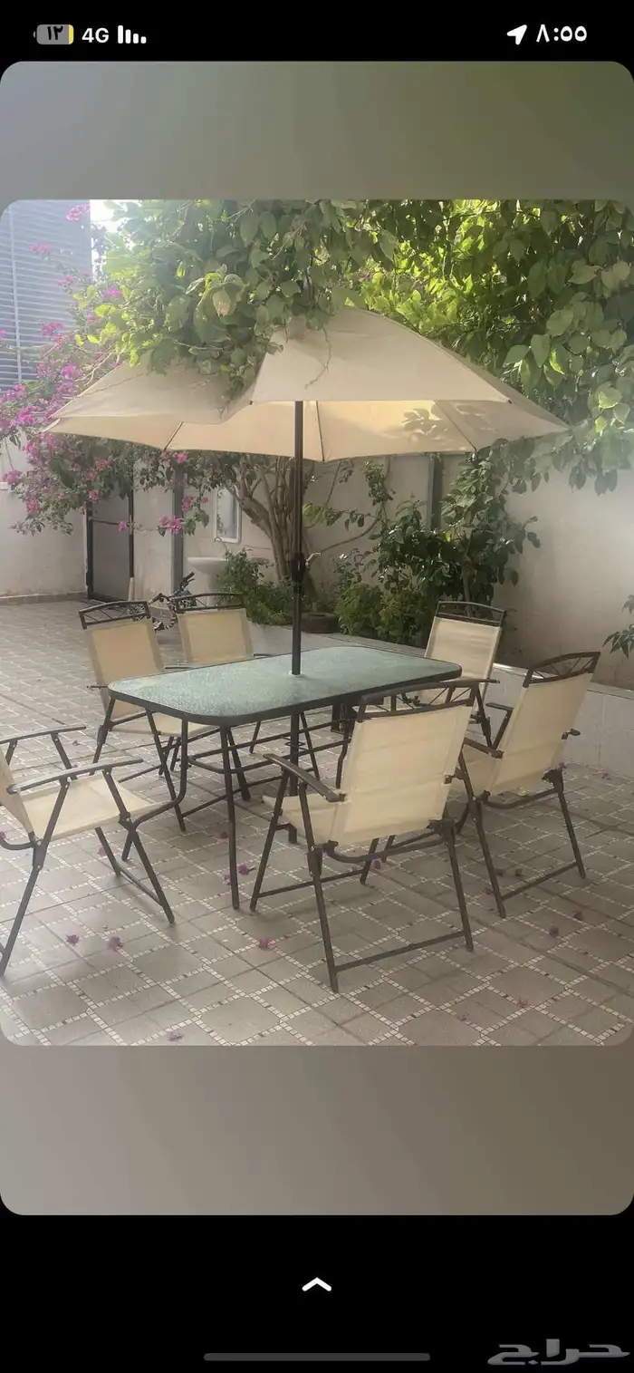 طاوله 6 كراسي ومظله 0