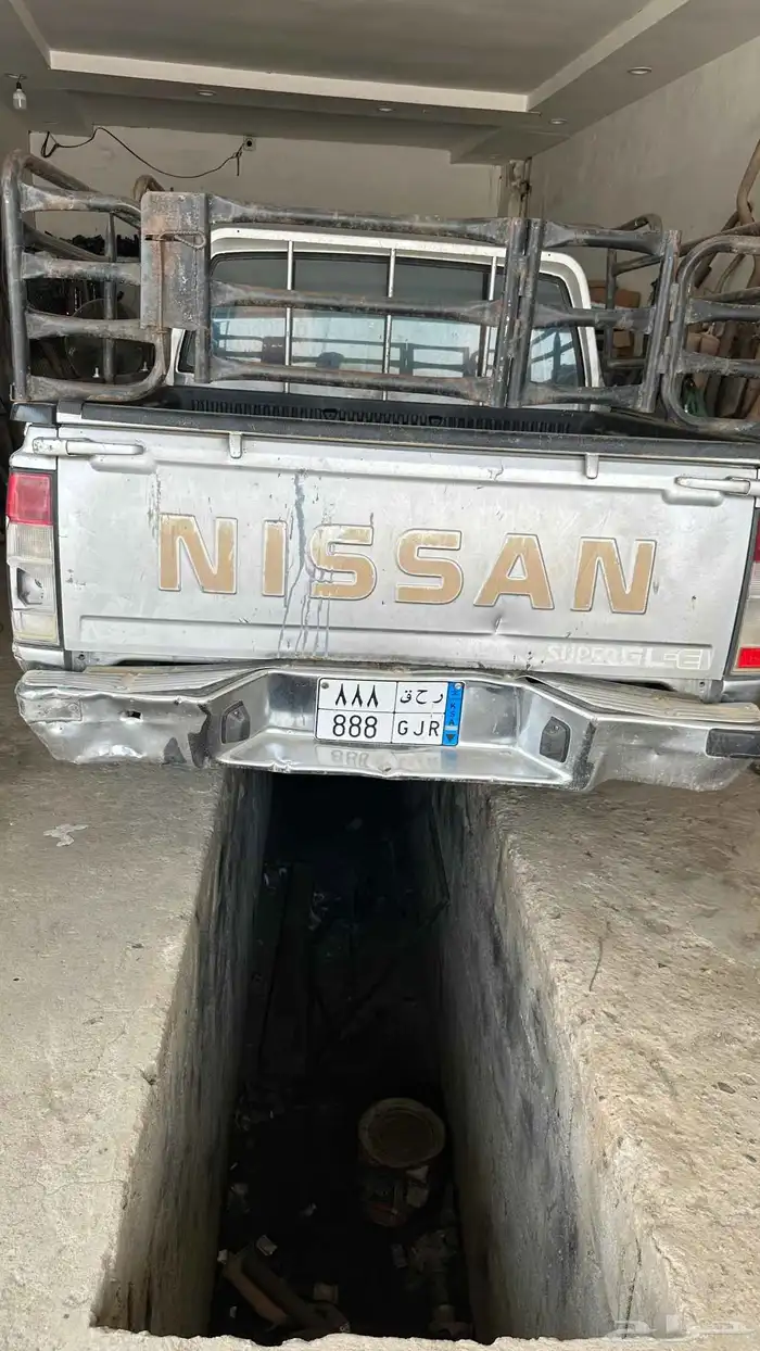 سيارة ددسن 2002 مع اللوحة مميزه نقل 0