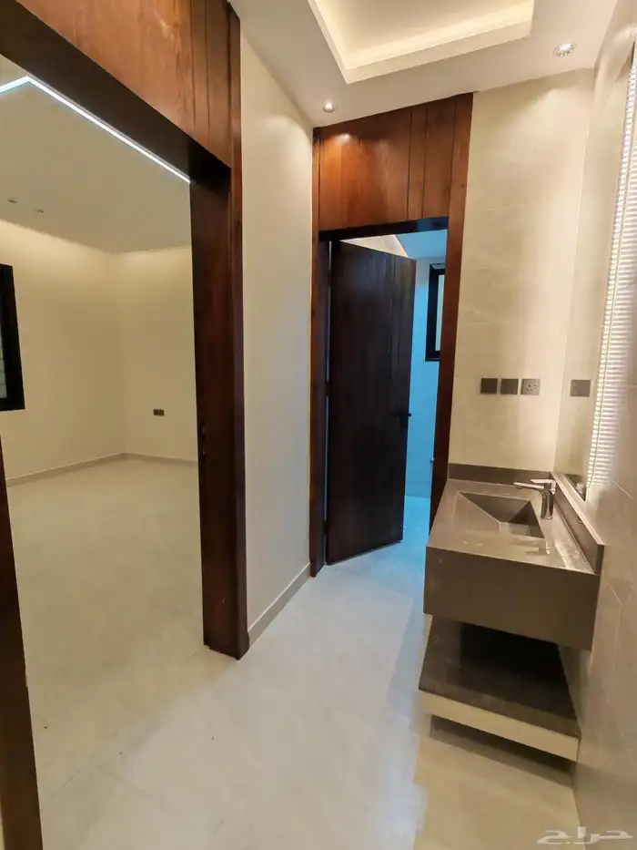 للبيع شقه دور ارضي بحوش واسع وبايكه سياره بابها تصميم فاخر 20
