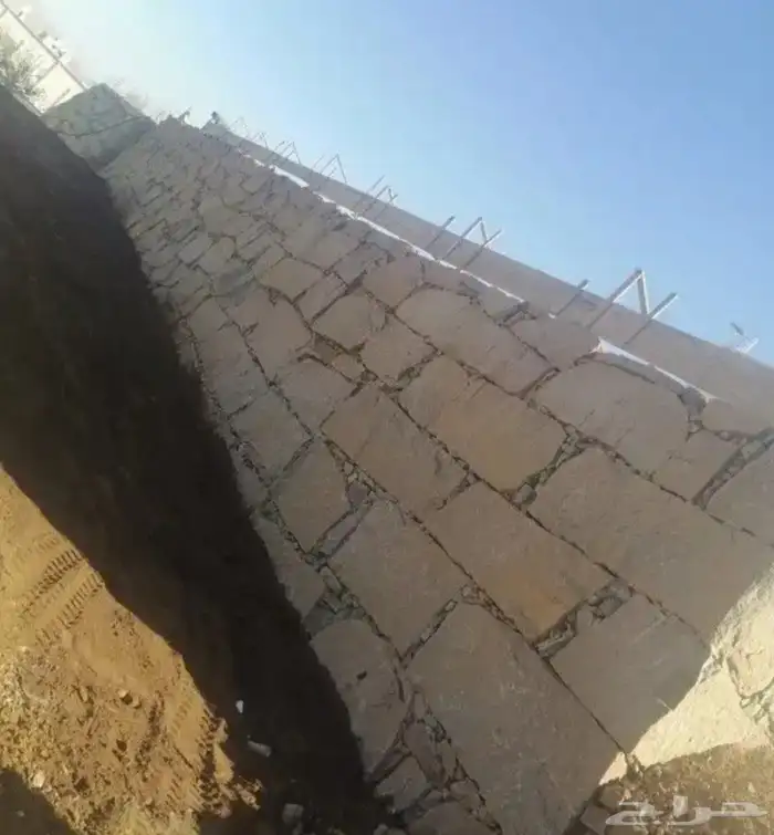 بناء جدران حجر بوكلين شيول وقص ارضيات ونقل ردميات 1