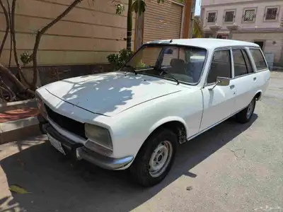 سيارة بيجو 504 كلاسيكية بلوحة مميزة رقمين index