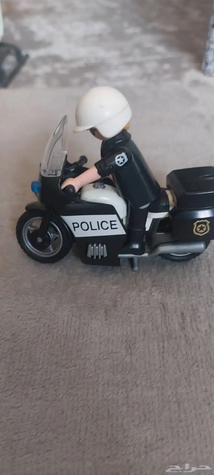 لعبة بلايمو بيل مكونة من بيت شرطة و هليكوبتر و سيارة و مدرعة 7