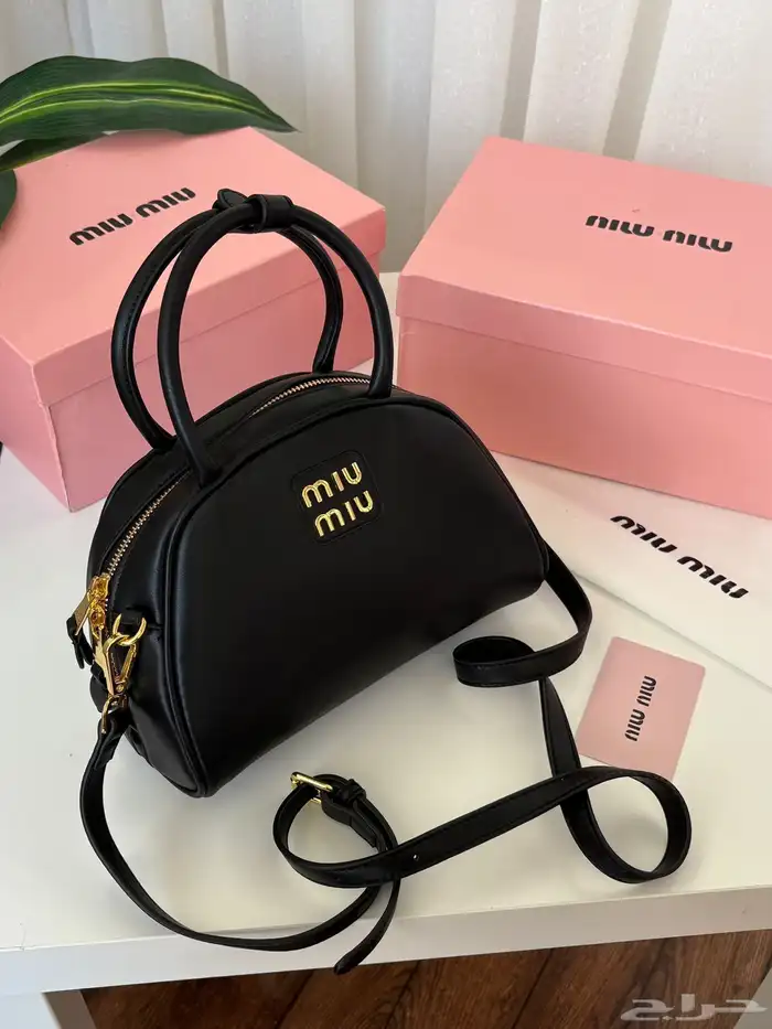 متجر_كاتشي شنطة جلد ميوميو اركادي لون بني داكن بمقابض علوية 7