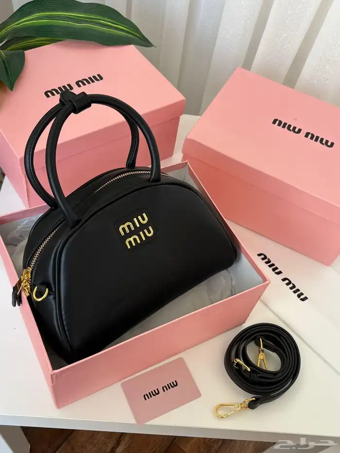 متجر_كاتشي شنطة جلد ميوميو اركادي لون بني داكن بمقابض علوية 3