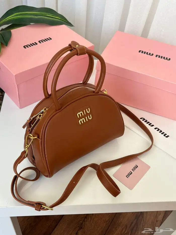 متجر_كاتشي شنطة جلد ميوميو اركادي لون بني داكن بمقابض علوية 1