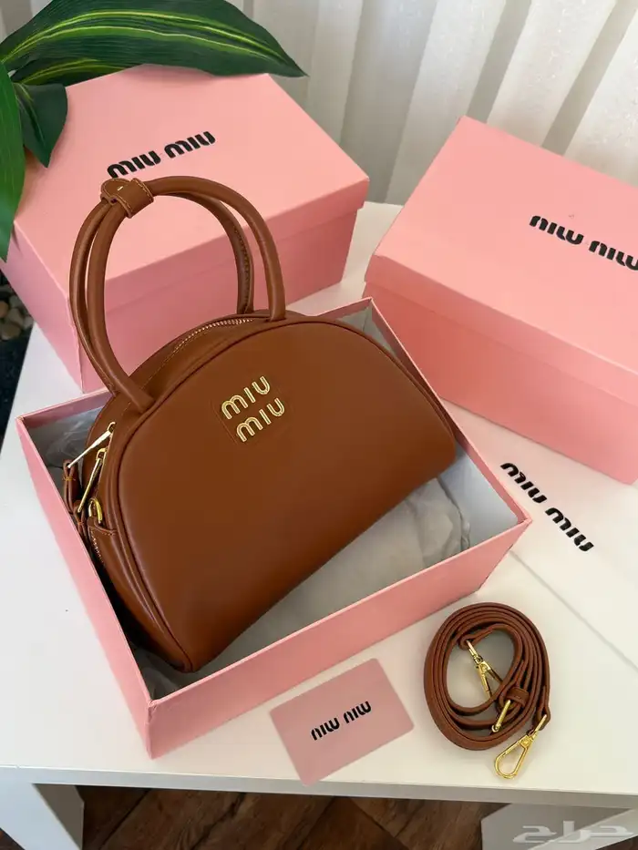 متجر_كاتشي شنطة جلد ميوميو اركادي لون بني داكن بمقابض علوية 4