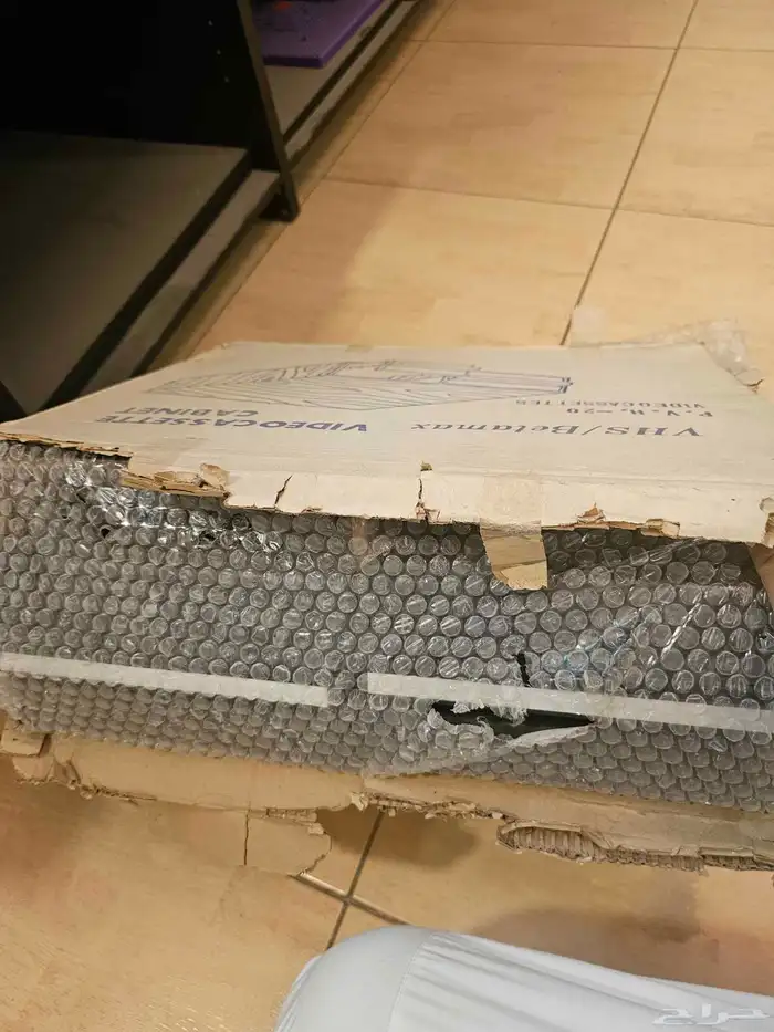 ادراج لحفظ اشرطة الفيديو الصغيره والكبيرة 0