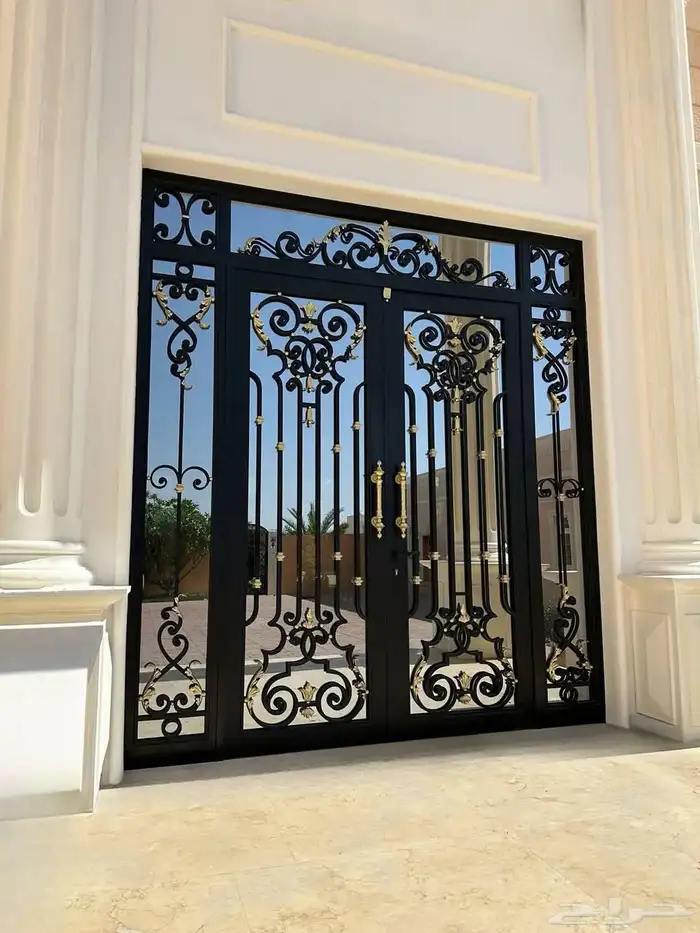 ابواب كلادينج ابواب حديد درابزين مظلات سيندوتش بينل درايش 0