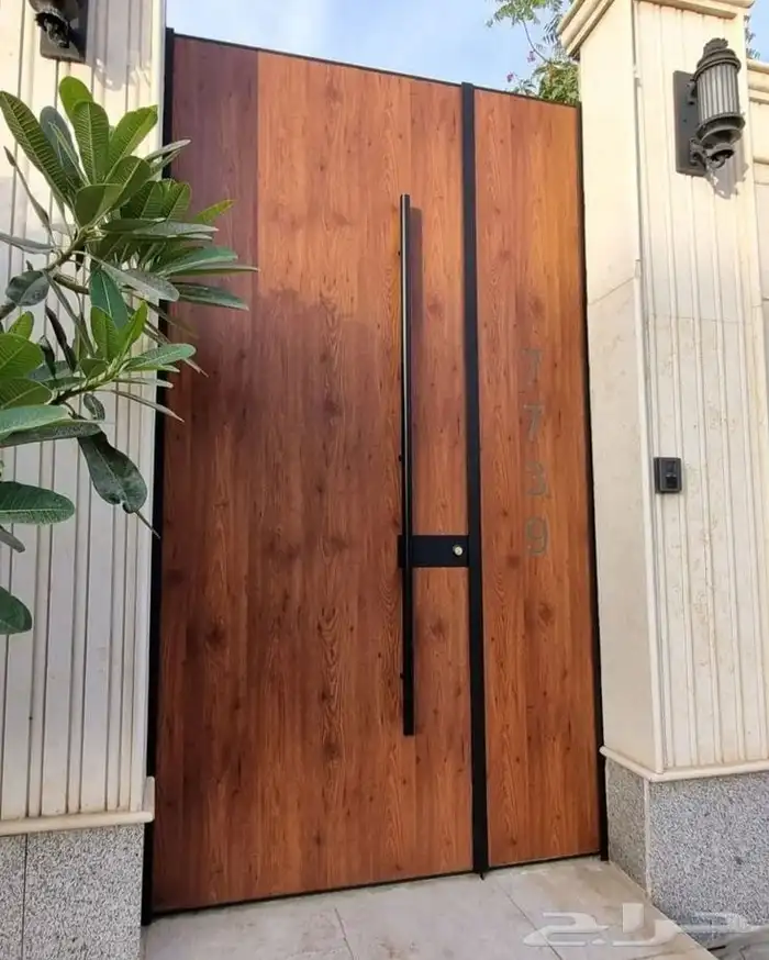 ابواب كلادينج ابواب حديد درابزين مظلات سيندوتش بينل درايش 9