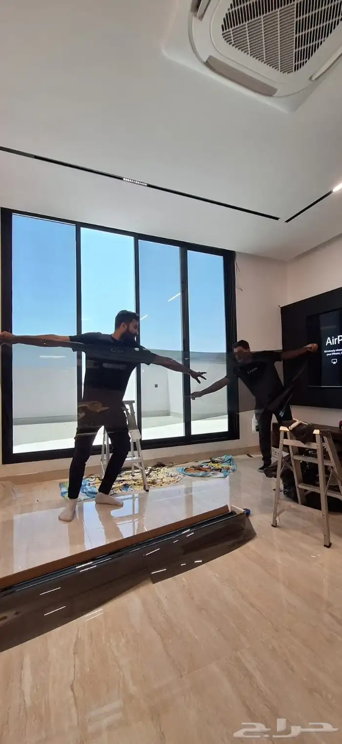 عازل زجاج المباني 0