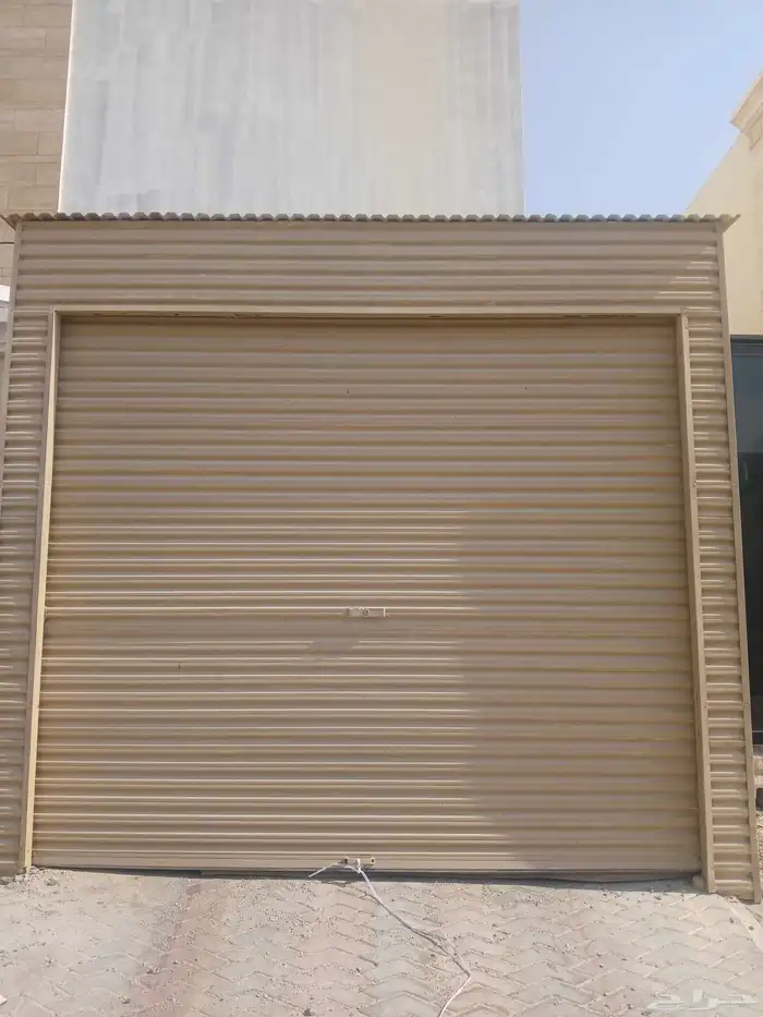 للبيع باب قراج شغال ريموت 0