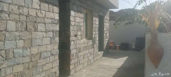 بنا حجر جدار 0