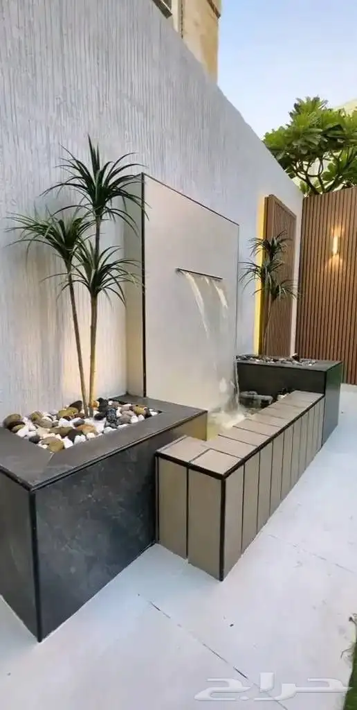 تنسيق حدائق اشجار جلسات احواض زرعيه شلالات مجلس زجاج 9