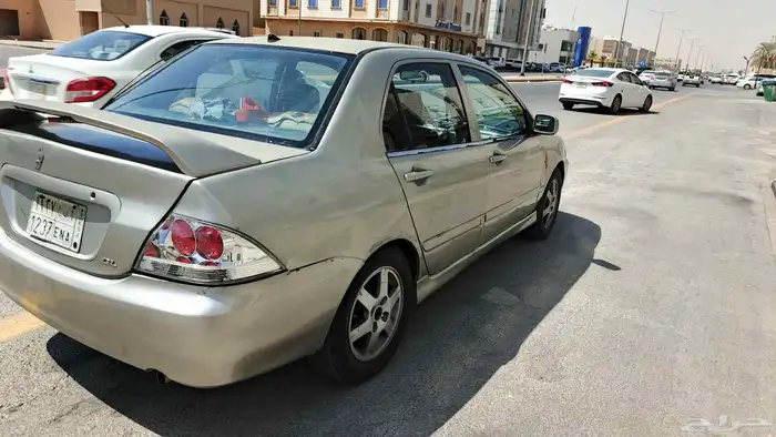 سياره ميتسوبيشي لانسر للبيع 2009 استماره جديد فحص جديد ما شا 3