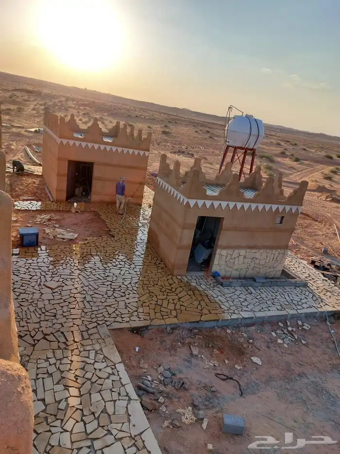 بنا بيوت طيني 0