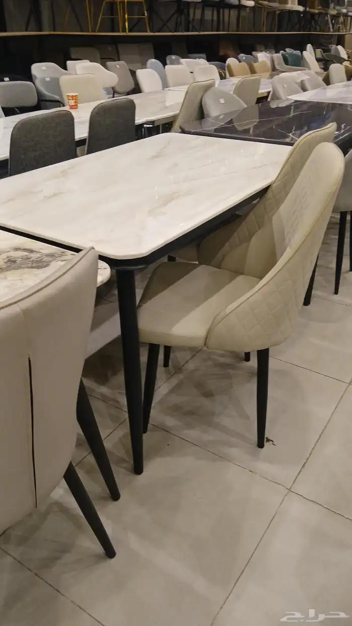 طاولات طعام رخام وخشب جلد وقماش 7