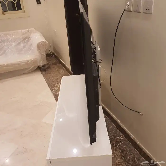 تلفزيون 55 بوصه مع حامل 1