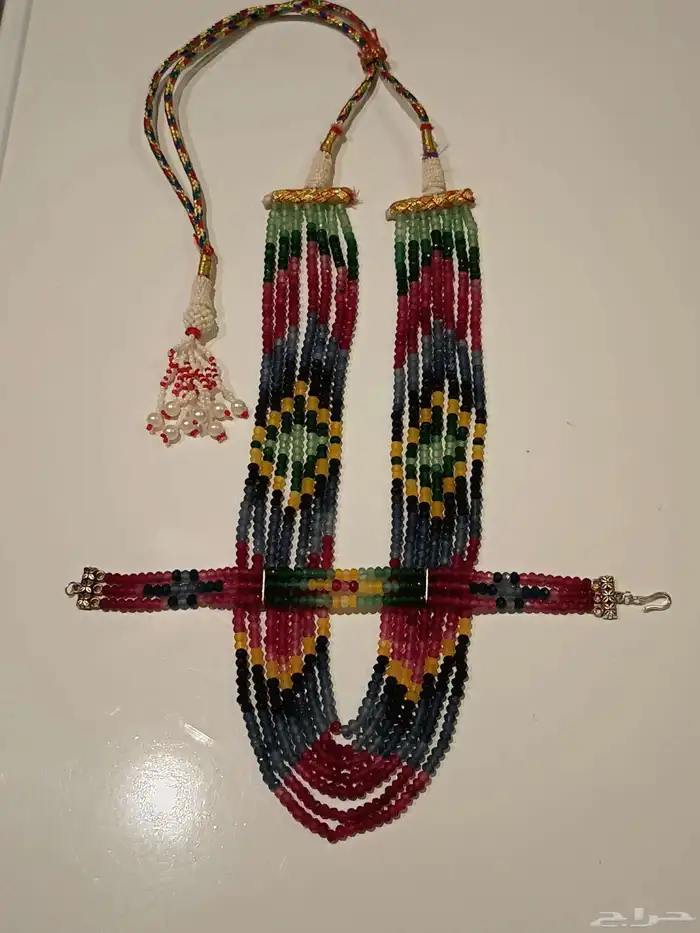 عقد نسائي من احجار الزمرد والياقوت والزفير 8