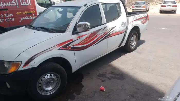 ونيت مستوبيشي 2009 L200بنزين استماره وفحص جديدجير عادي مكيف 0
