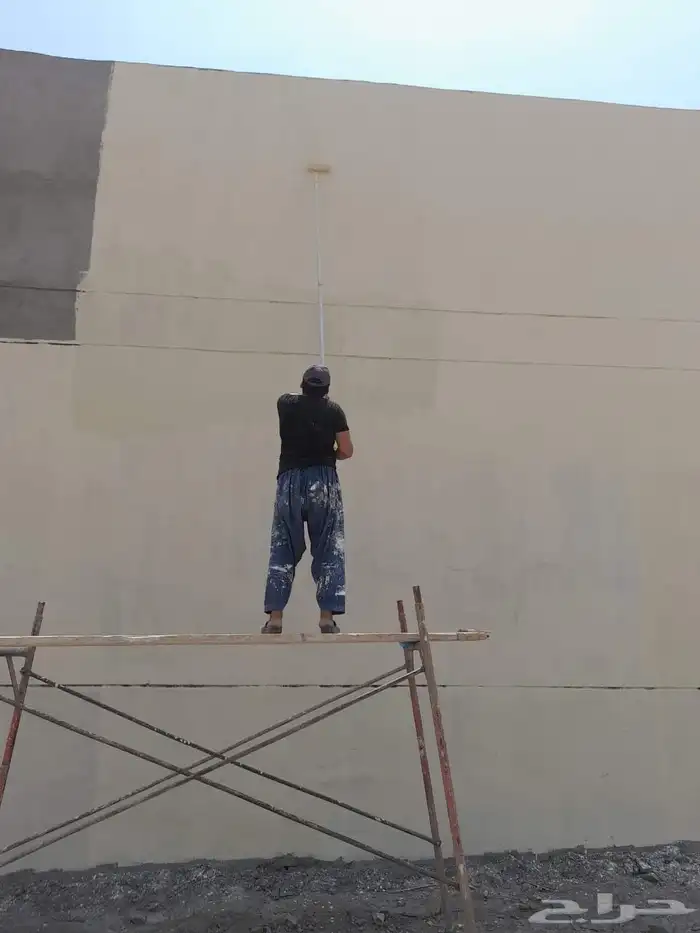 دهان. painter in the house is and buildings and 3