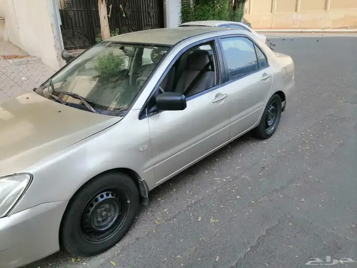 لانسر بومه 2010 اوتماتيك 2