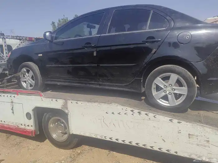 متسوبيشي قرش طقم جنط الأصلي مع كفرات جديده 1