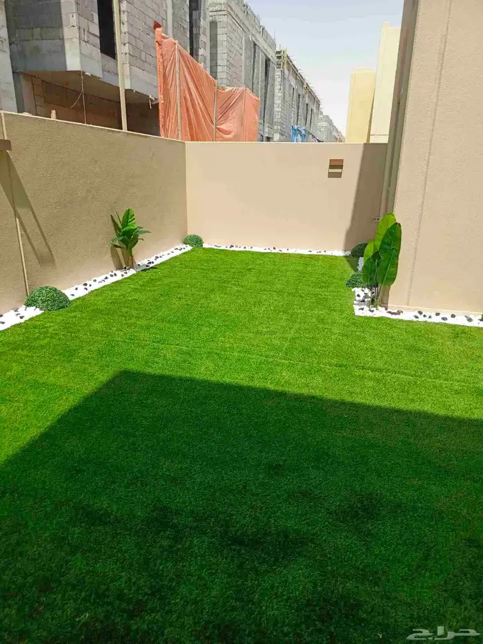 تنسيق حدائق وديكورات حجريه وعشب ارضي وجدارى 3