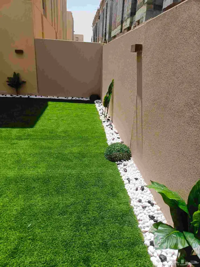 تنسيق حدائق وديكورات حجريه وعشب ارضي وجدارى 6
