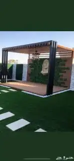 تركيب عشب صناعي وبديل الخشب الجداري 5