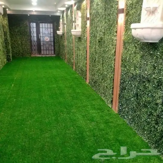 تركيب عشب صناعي وبديل الخشب الجداري 1