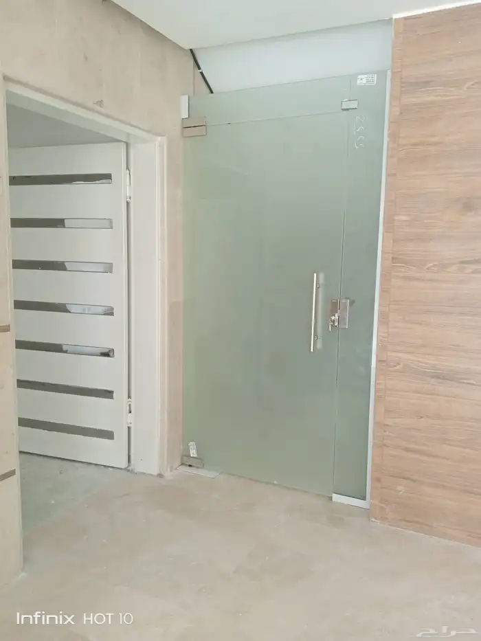 ا تركيب زجاج سكريت 12 ملي حسب الطلب -صيانه جميع الابواب الزج 5