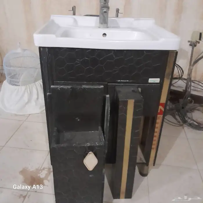أغراض للبيع سخانات وحوض مغسلة ومعه تقفيله ومرآة 1