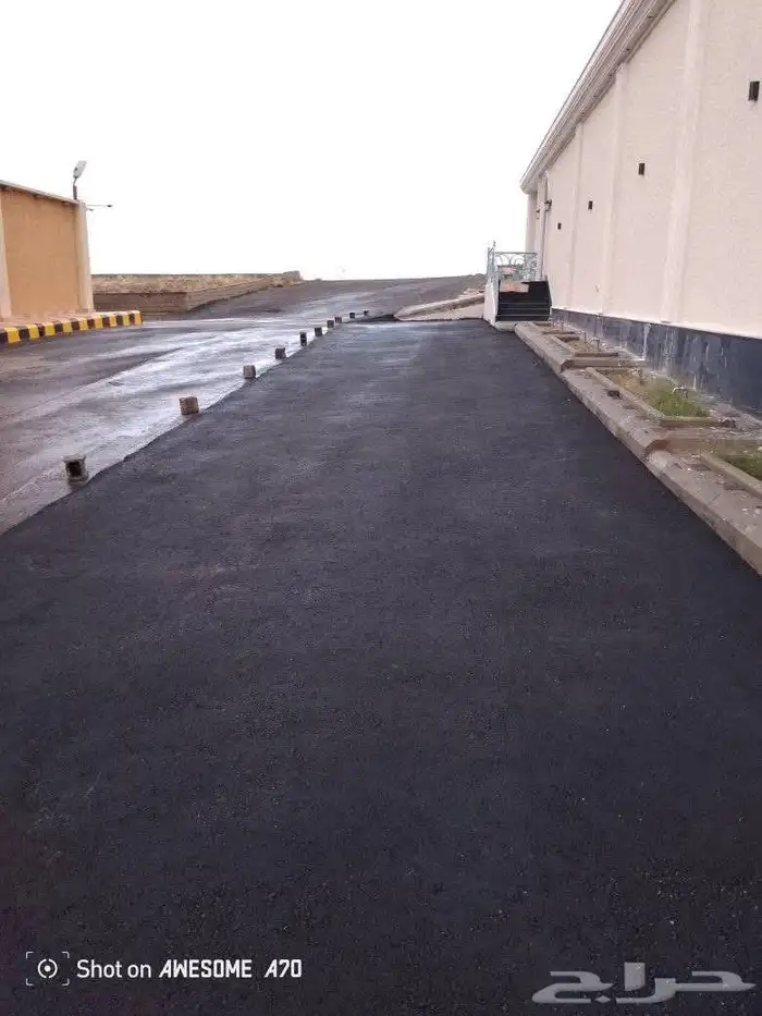 مقاول الأعمال الاسفلت دلق الأرضية 0