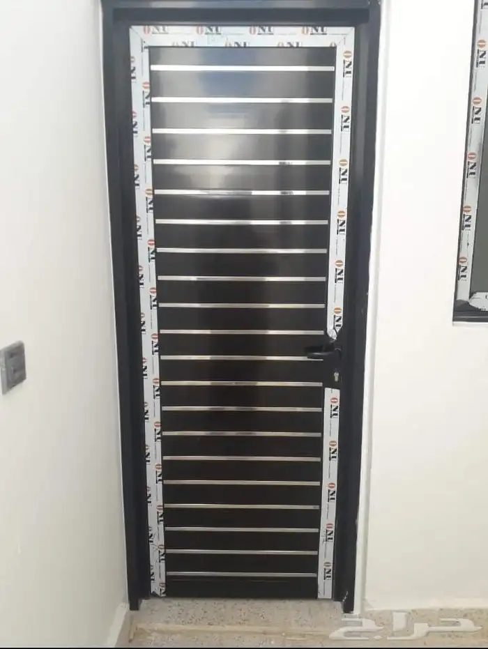 تفصيل ابواب المنيوم باب خشب 0