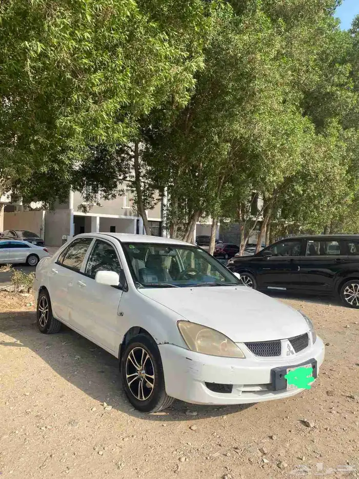 ميتسوبيشي لانسر 2010 بومة 3