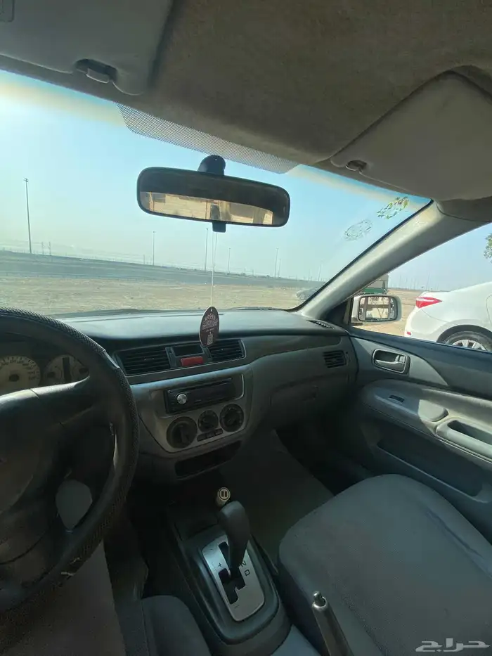 ميتسوبيشي لانسر 2010 بومة 0