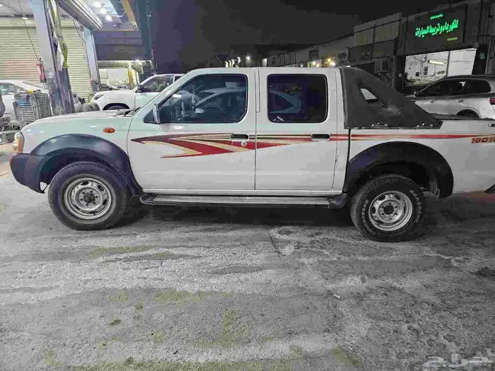 نيسان ددسن 2009 دبل ماشيه 470 الف جير مكيه شاص مكيف شرط 0