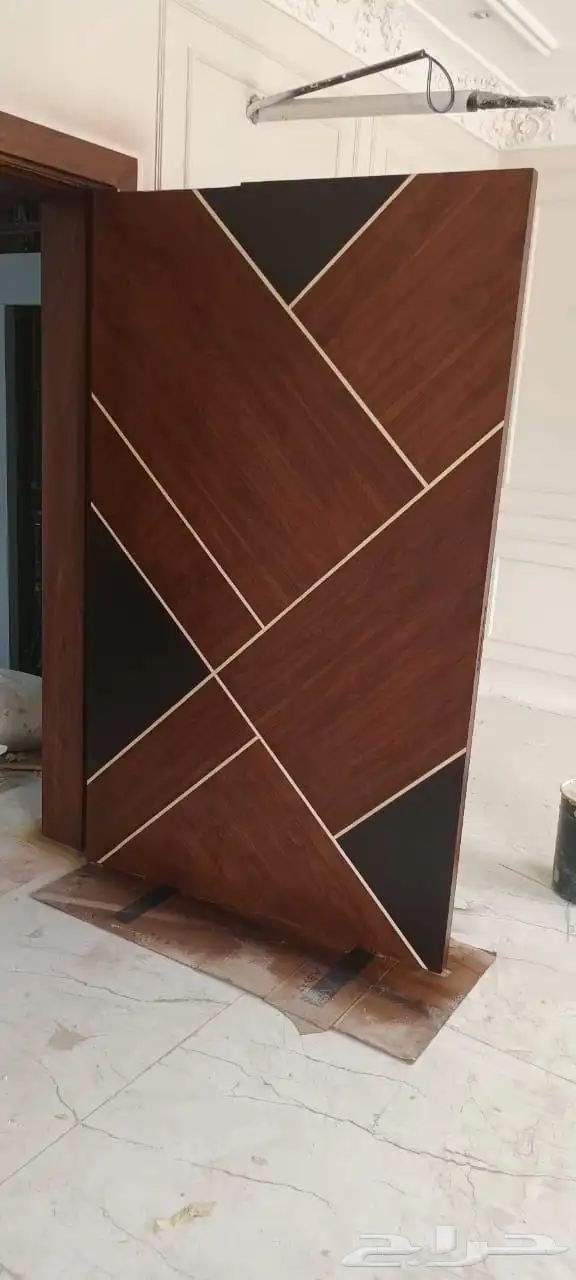 معلم متخصص في دهان الأبواب وغرف النوم بمكه 0