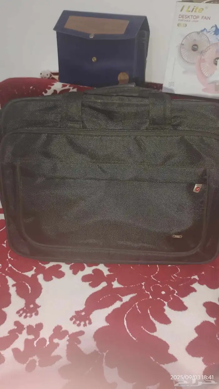 شنطه اي مدرسة او الأعمال 1