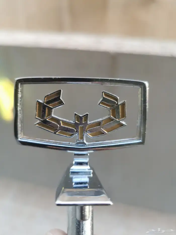 تمثال كبوت نيسان لوريل 84 3