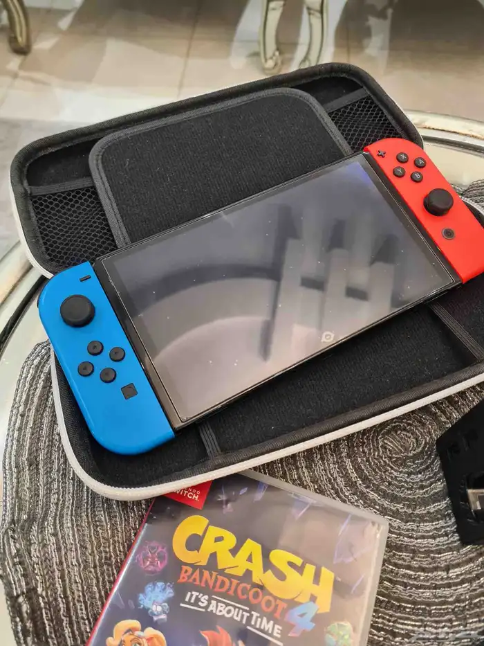 نينتندو سويتش OLED للبيع مع كامل ملحقاته 5