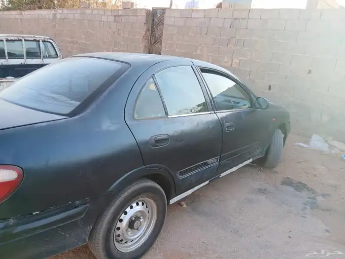 نيسان صني 2003 للبيع فحص منتهي من حول 8اشهر استمارة باقي 1
