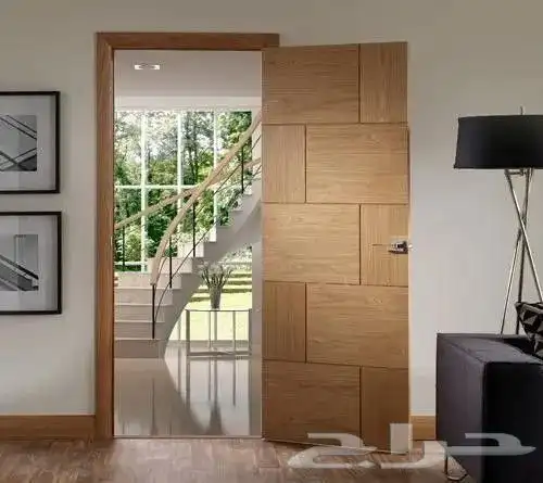 A carpenter specializing in wooden doors and cabinets offeri 2