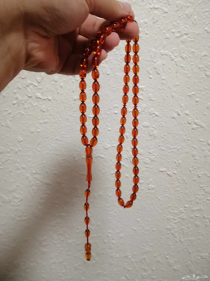 سبحة كهرمان لون نحاسي صافي (جديدة). 0