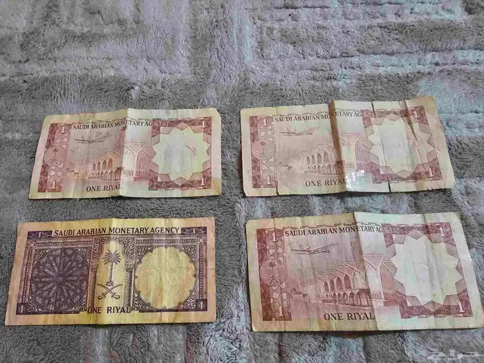 ريال الملك عبدالعزيز فضه وريالات الملك فيصل . 0