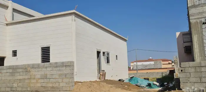 ديكورات خارجية اسمنتيه بطحاء الرياض حجر لياسه ملونه كسر رخام 8