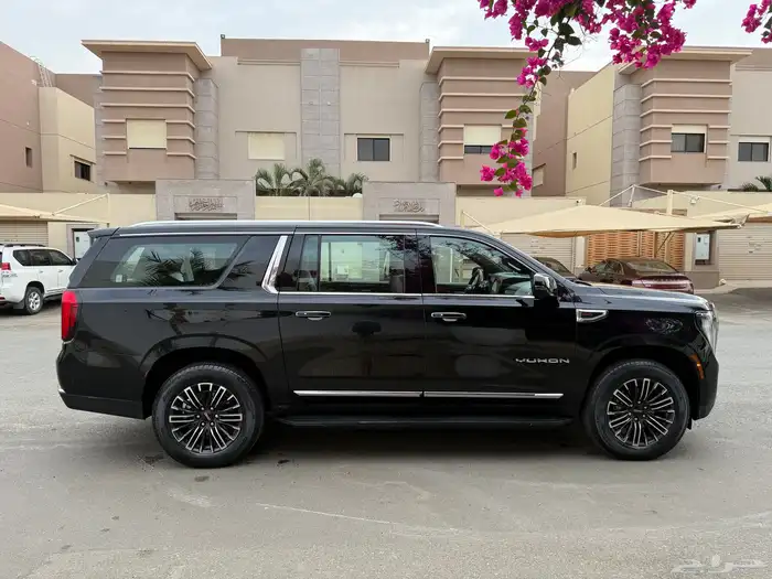GMC Yukon Elevation Model 2025 AlJomaih almost new 11