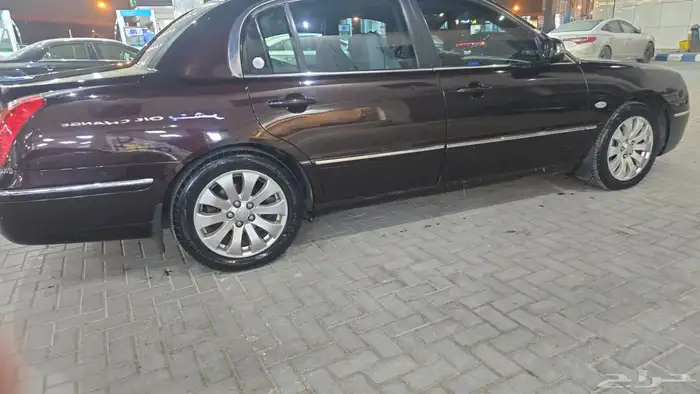 كيا اوبيروس مديل 2009 فل كامل بصمه اللون عنابي 4